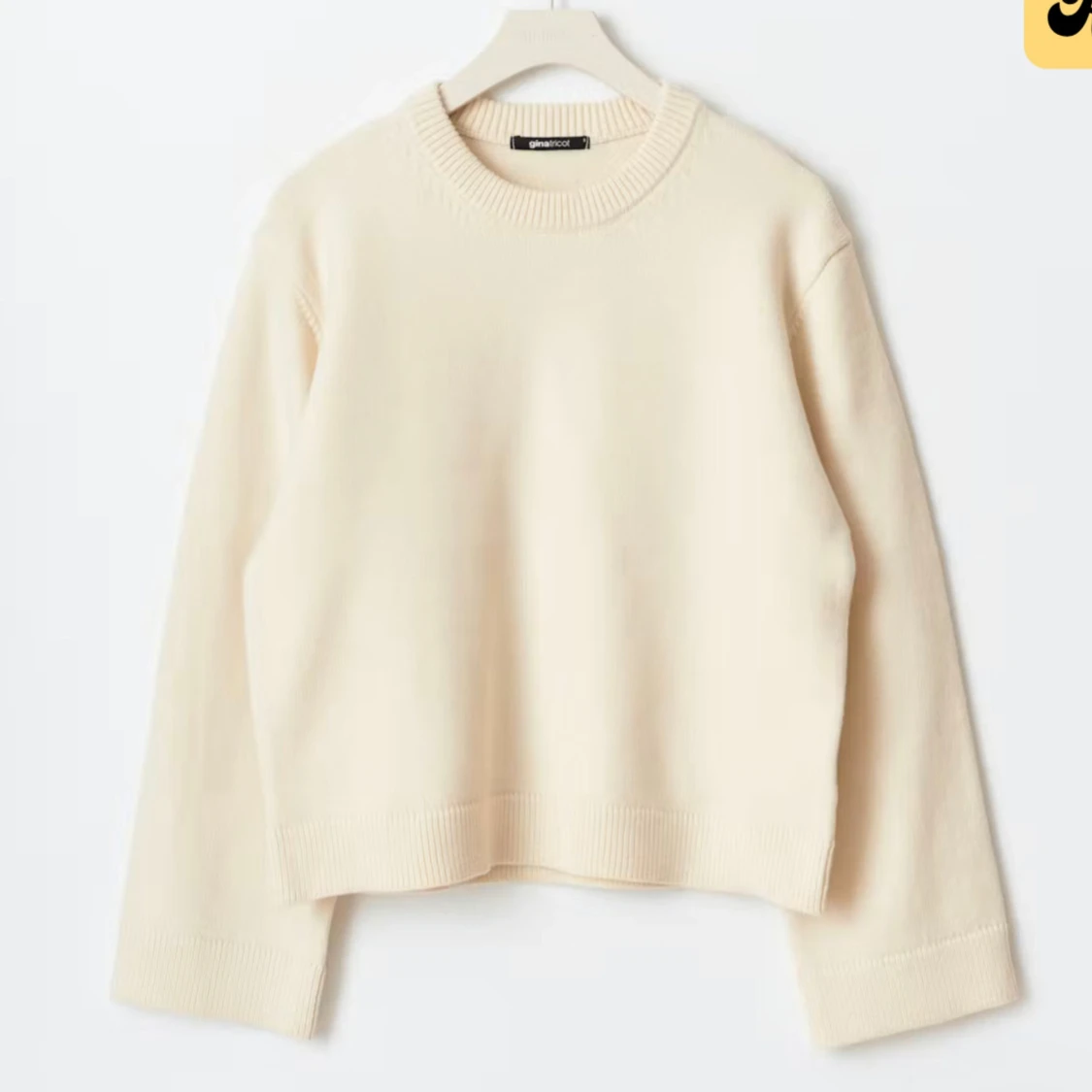 Beige stickad tröja från Gina Tricot