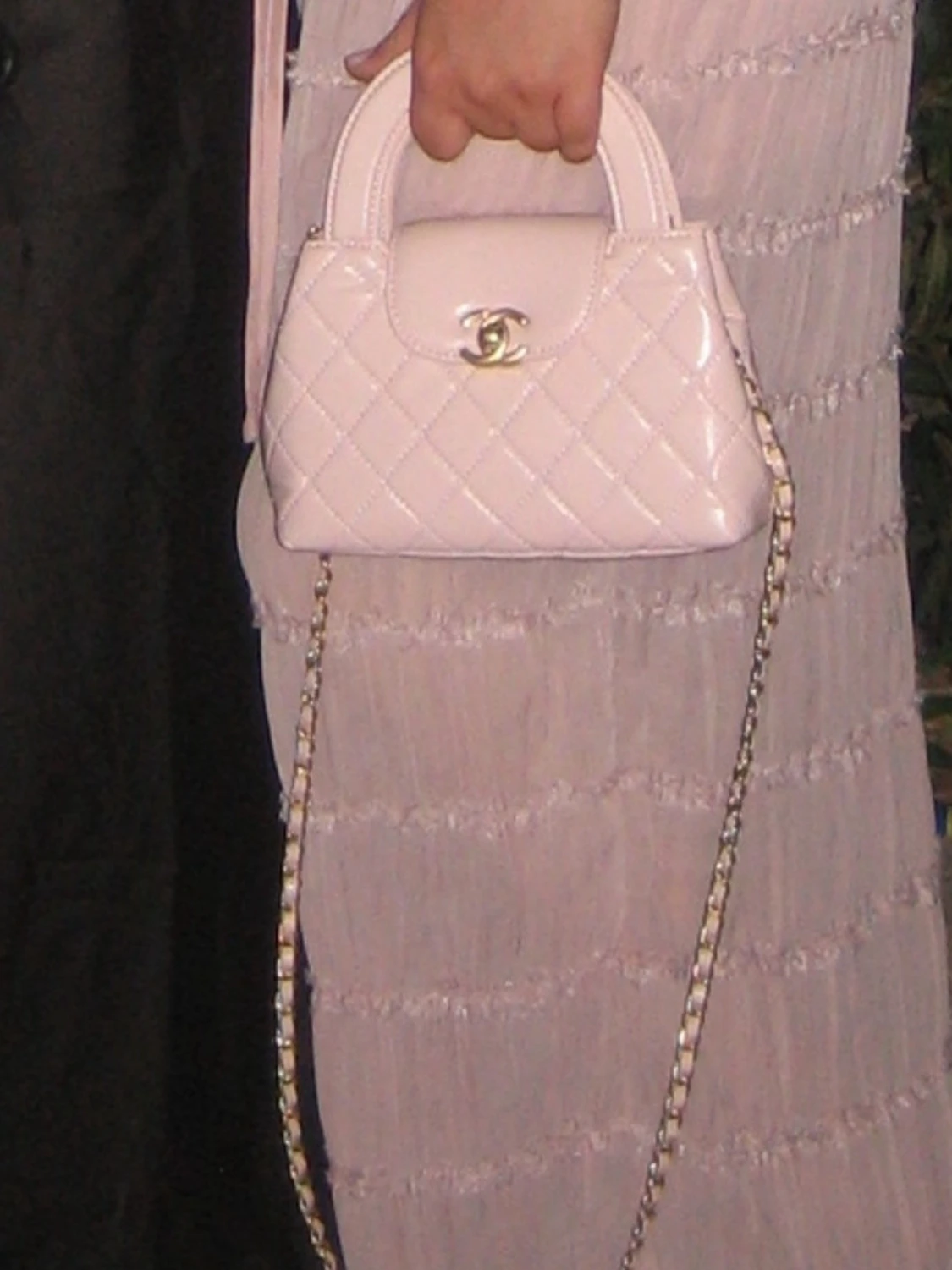 Ljusrosa quiltad handväska