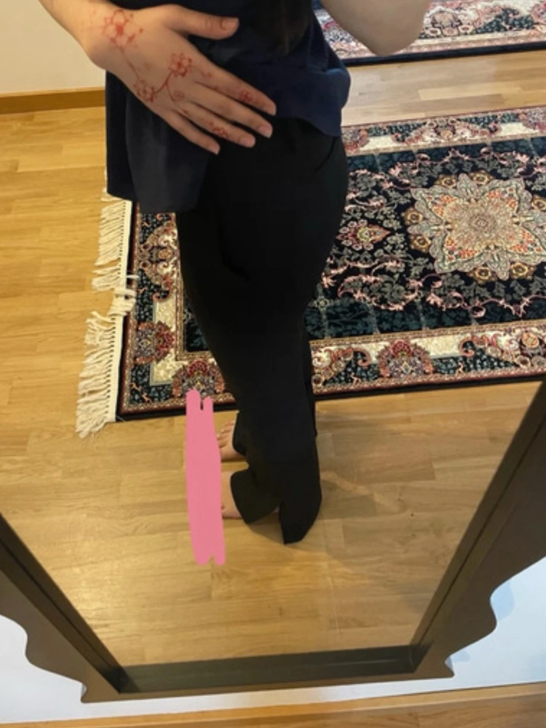 Svarta bootcut byxor med slits