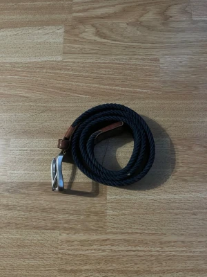  Bälte ljusblå  - För 12,13,14 åringar 