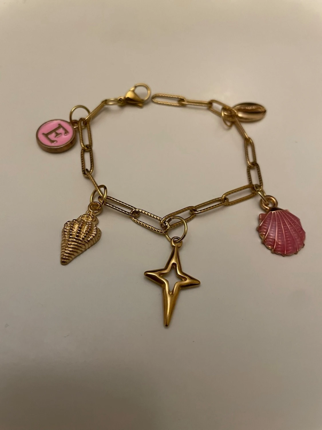 Guld berlockarmband  - 2