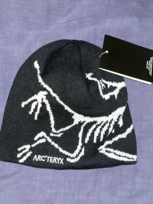 Svart mössa från Arc'teryx - Unused Black Arc’teryx Toque head beanie