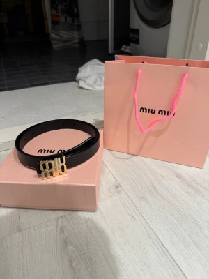 Miu Miu black and gold belt -105cm - 105cm long. Just as new with no defects. Please send an offer :)
