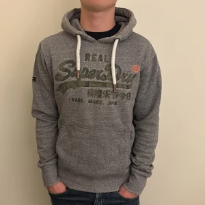 Superdry Hoodie - - Condition: 8/10 - Color: Gray  - Size: M