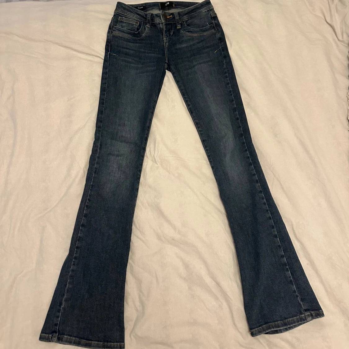 Mörkblå lowrise bootcut jeans Valerie W24 L32