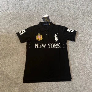 Polo Ralph Lauren New York - Helt ny aldrig använd bra kvalitet skriv om ni har frågor eller är intresserade