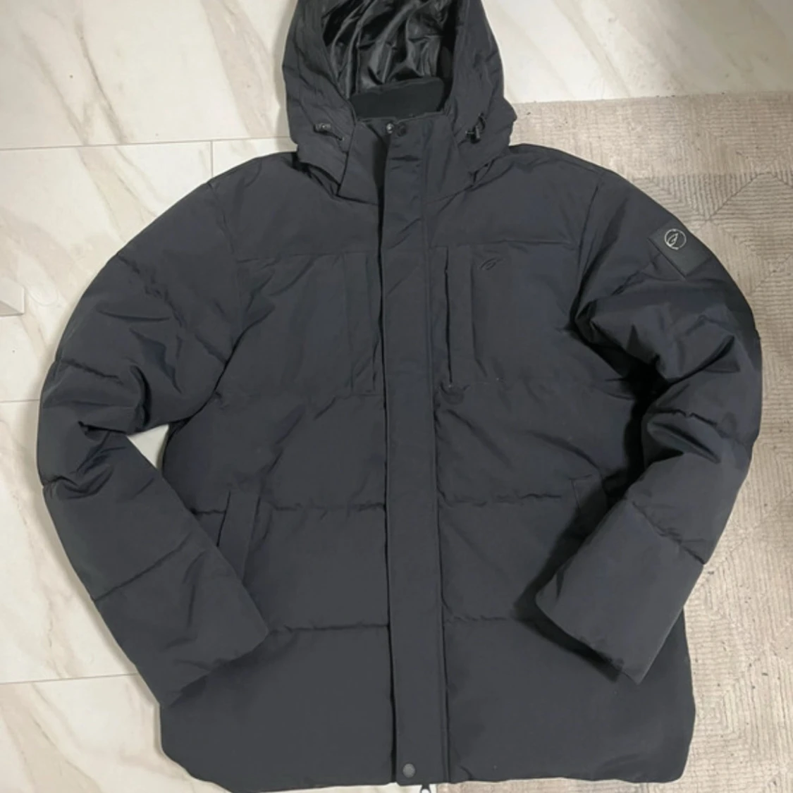 Svart pufferjacka från Five Seasons