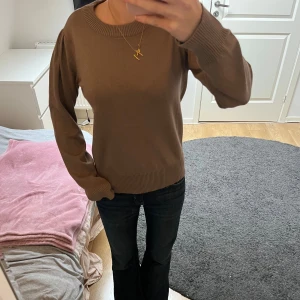 Långärmad topp i guld - Guldig långärmad topp från saint tropez, använt en gång 