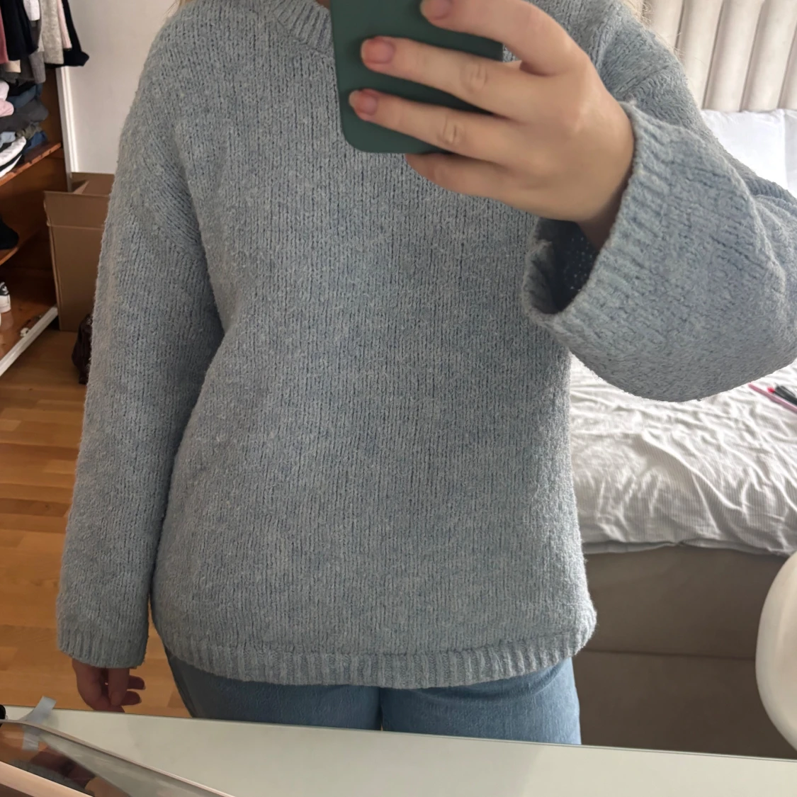 Ljusblå stickad tröja