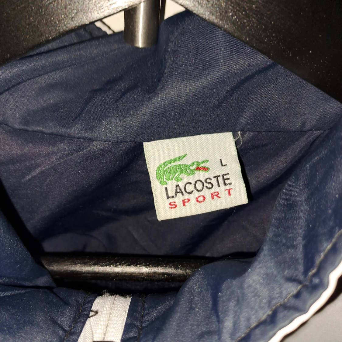 Blåvit vindjacka från Lacoste Sport - 2