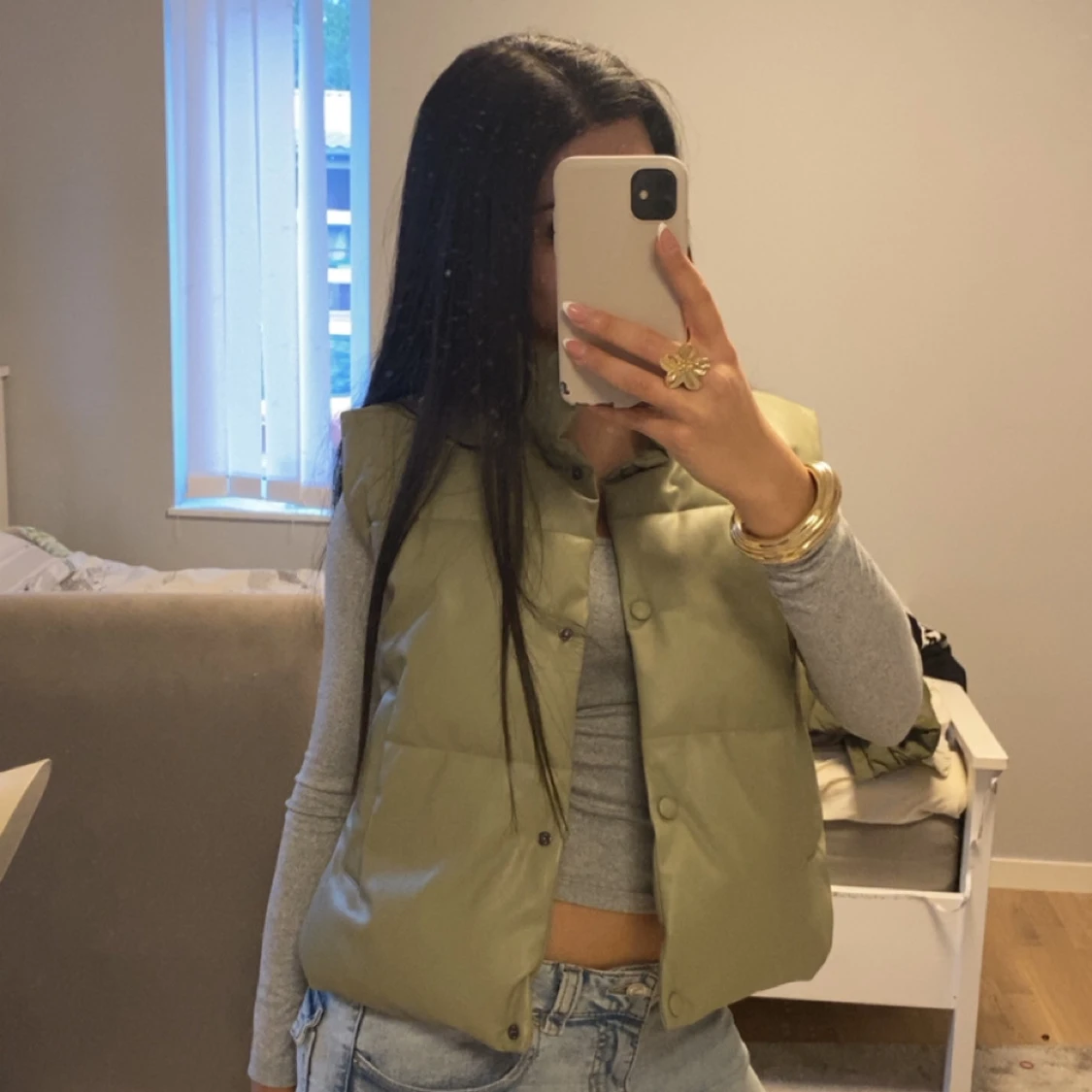 Ljusgrön quiltad dunväst i skinnimitation