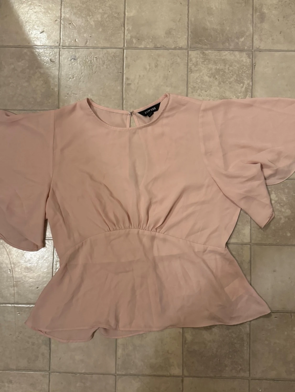 Ljusrosa blus från Express