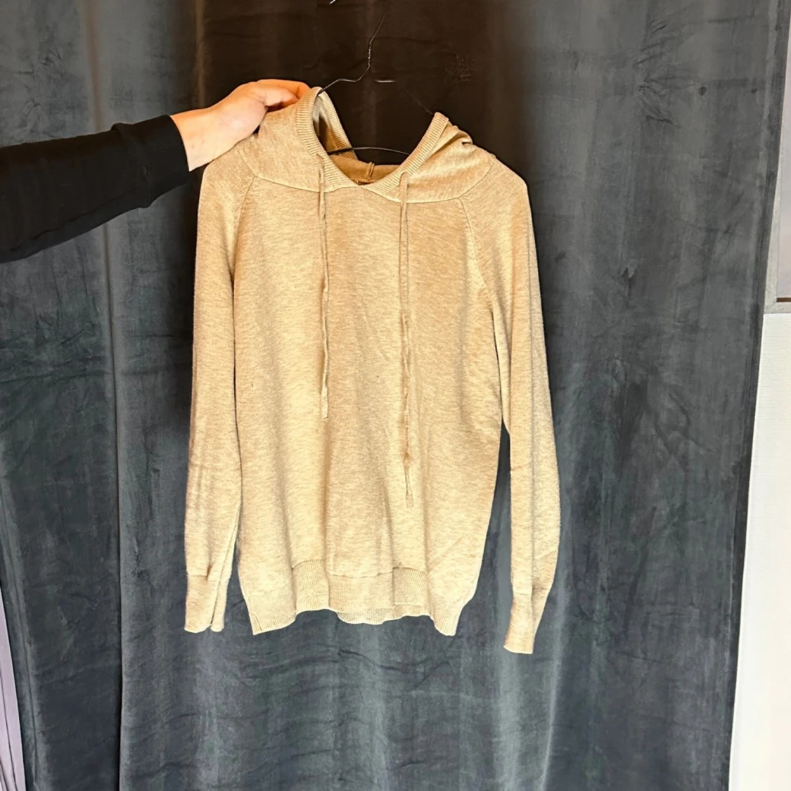 En eftertraktad stickad hoodie