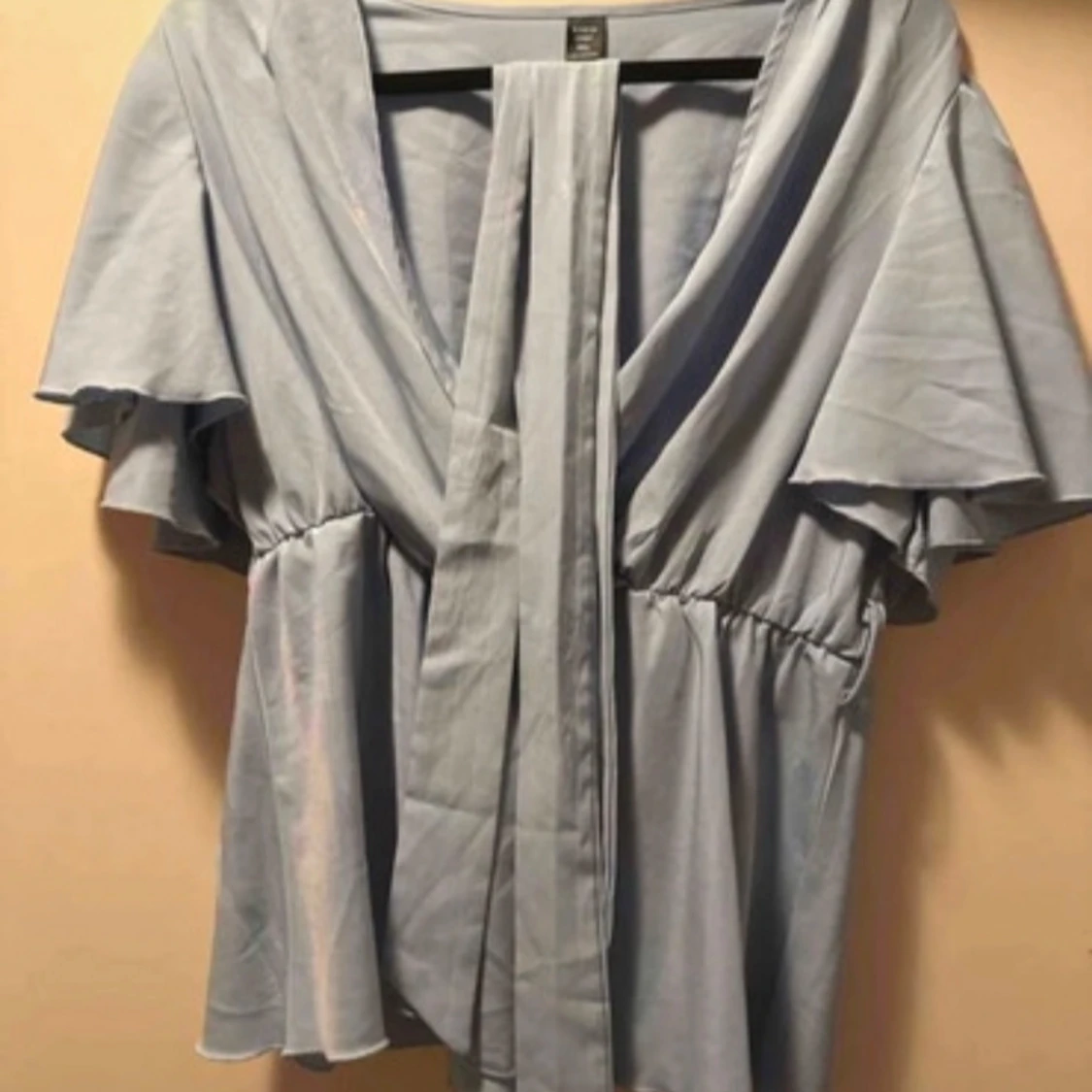 Ljusblå omlottblus med knytband - 1