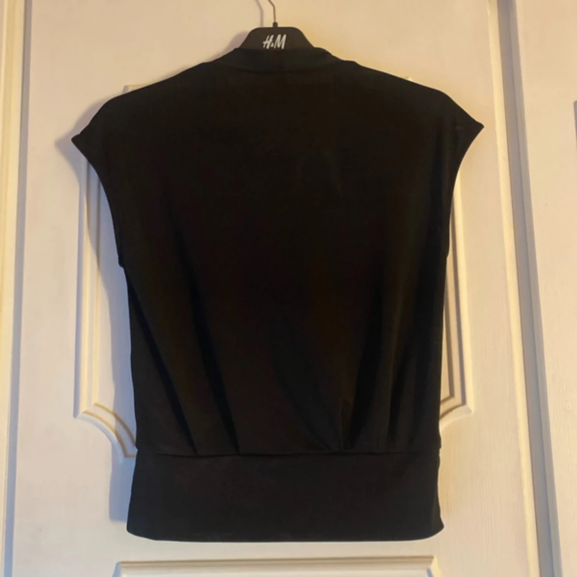 Svart omlottopp  - 1