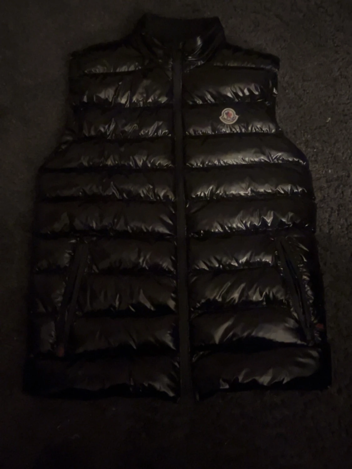 Svart dunväst från Moncler, storlek L