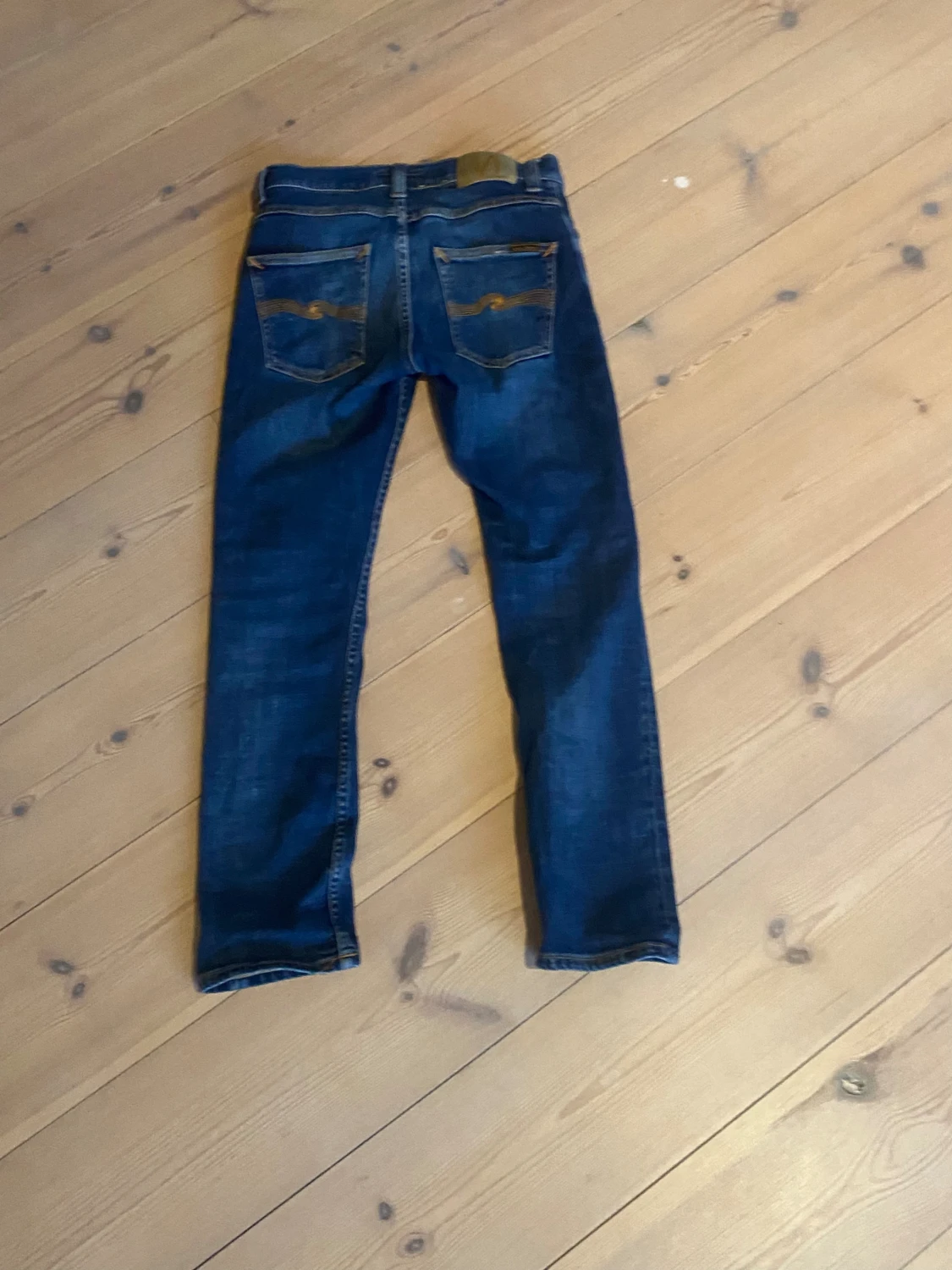 Mörkblå Nudie Jeans W27 L28