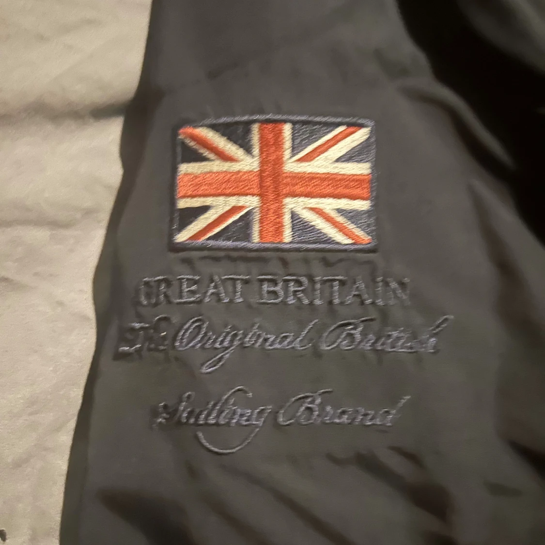 Svart vinterjacka från Henri Lloyd M - 1