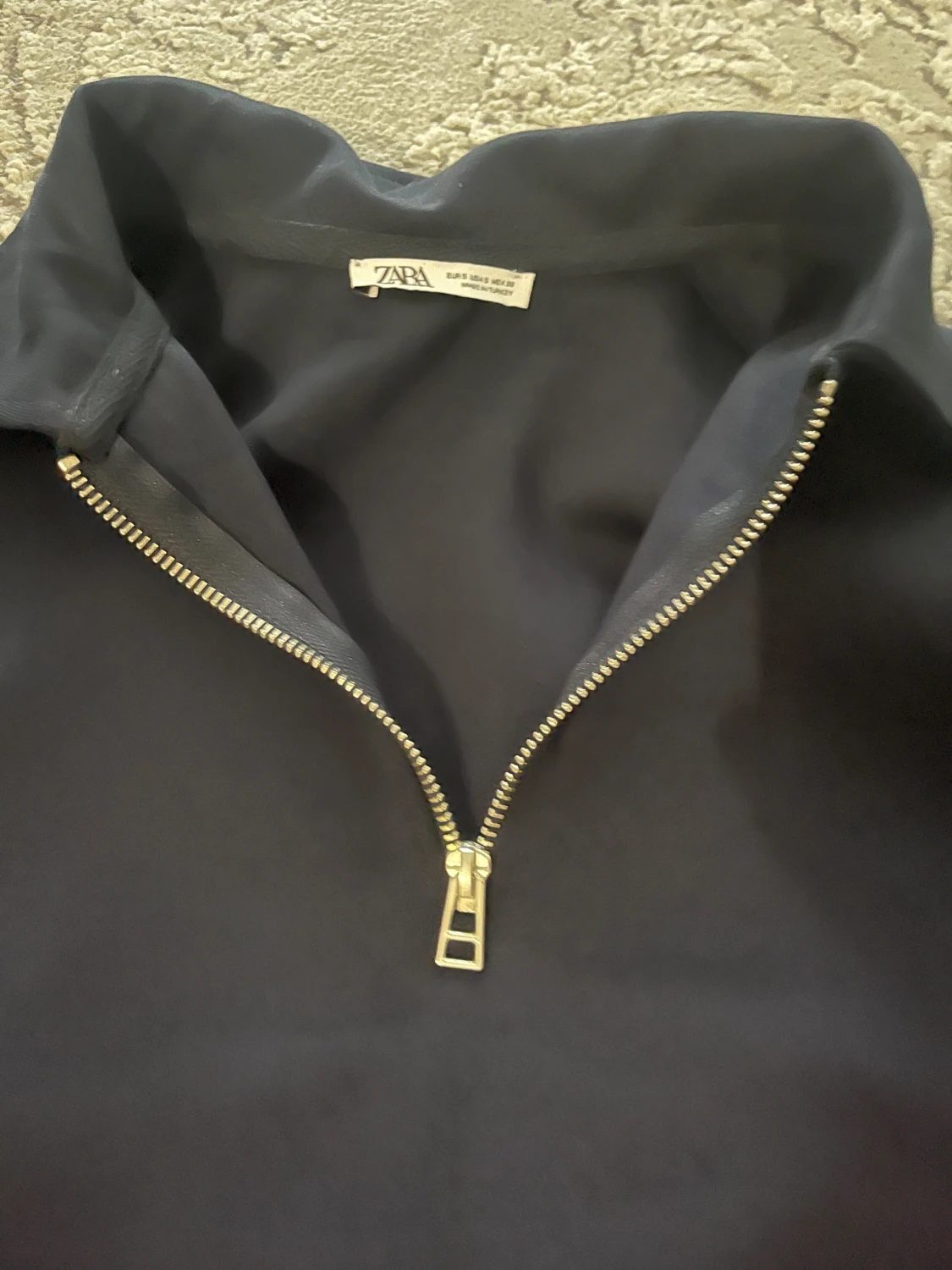 Mörkblå half zip jacka från Zara