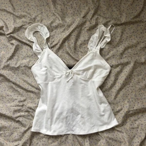 Fint linne med knyt på baksidan  - Jätte fint skick 