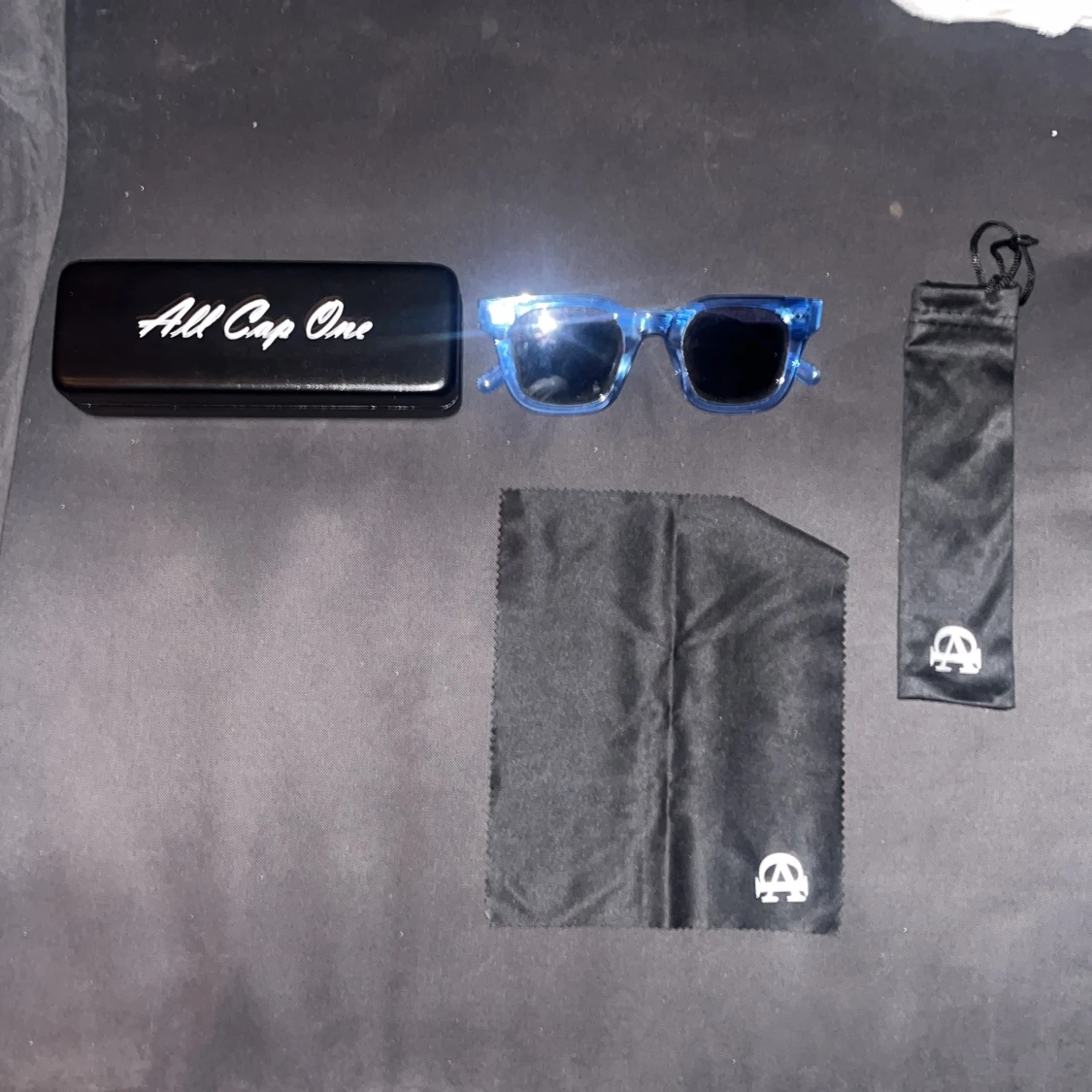 Blå transparenta solglasögon All Cap One