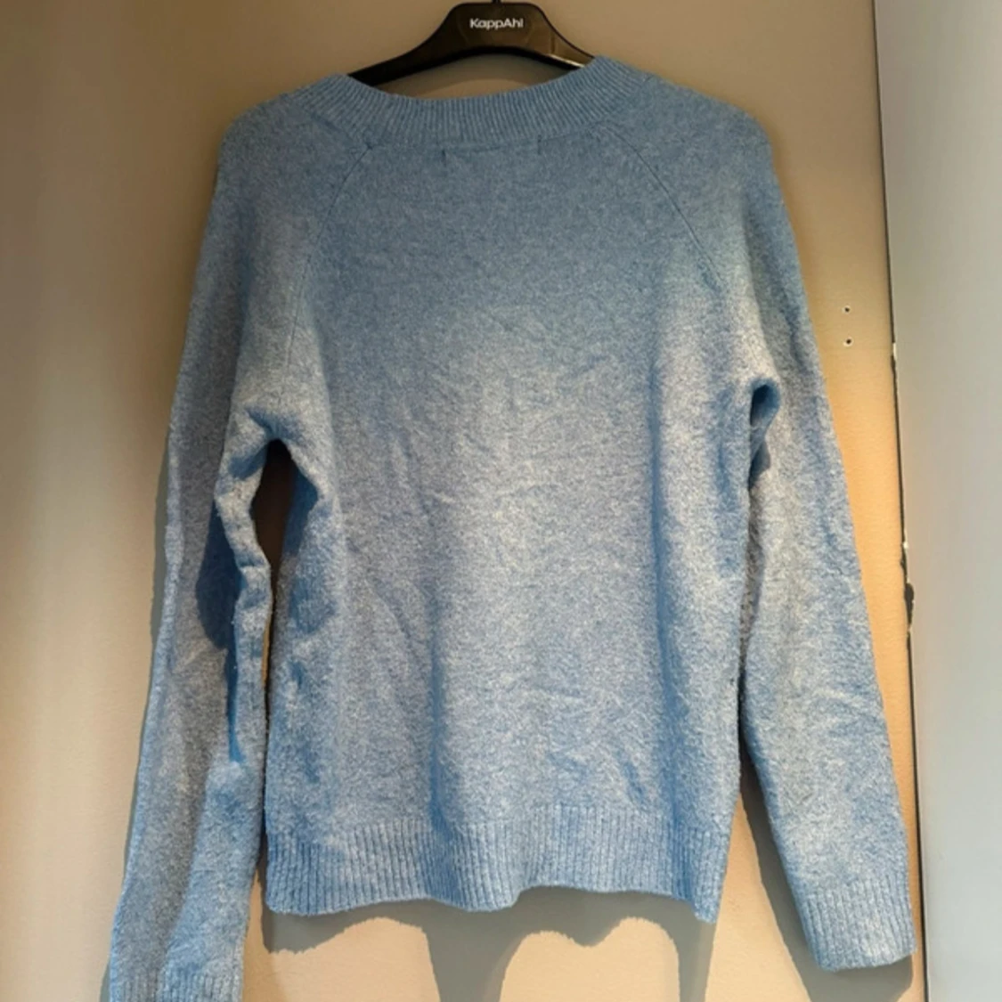 Ljusblå stickad tröja  - 1