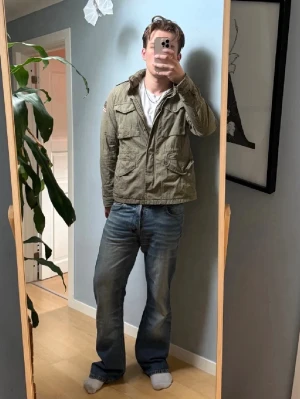 Ralph Lauren Jacka - Riktigt snygg Ralph lauren vintage jacka. 4 fickor och amerikanska flagga på en av armarna. L men passar M. Öppen för bud