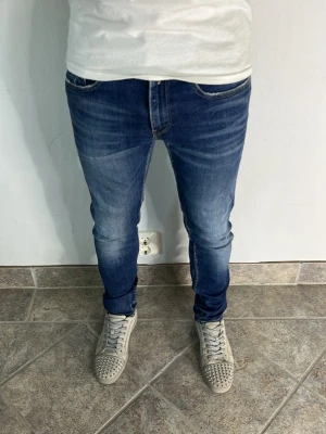 Replay Anbass Jeans - CONDITION — 9/10 Excellent condition.  Light signs of wear.     SIZE — 31/32 Model is 170 cm, 67kg  MEASUREMENTS (CM) (Please refer to the last photo for measurement guide)  A — 38 cm  B — 101 cm  C — 15 cm