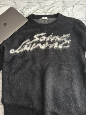 Saint Laurent knit sweater  - Säljer min Saint Laurent knit sweater. Använder den inte. Priset kan sänkas