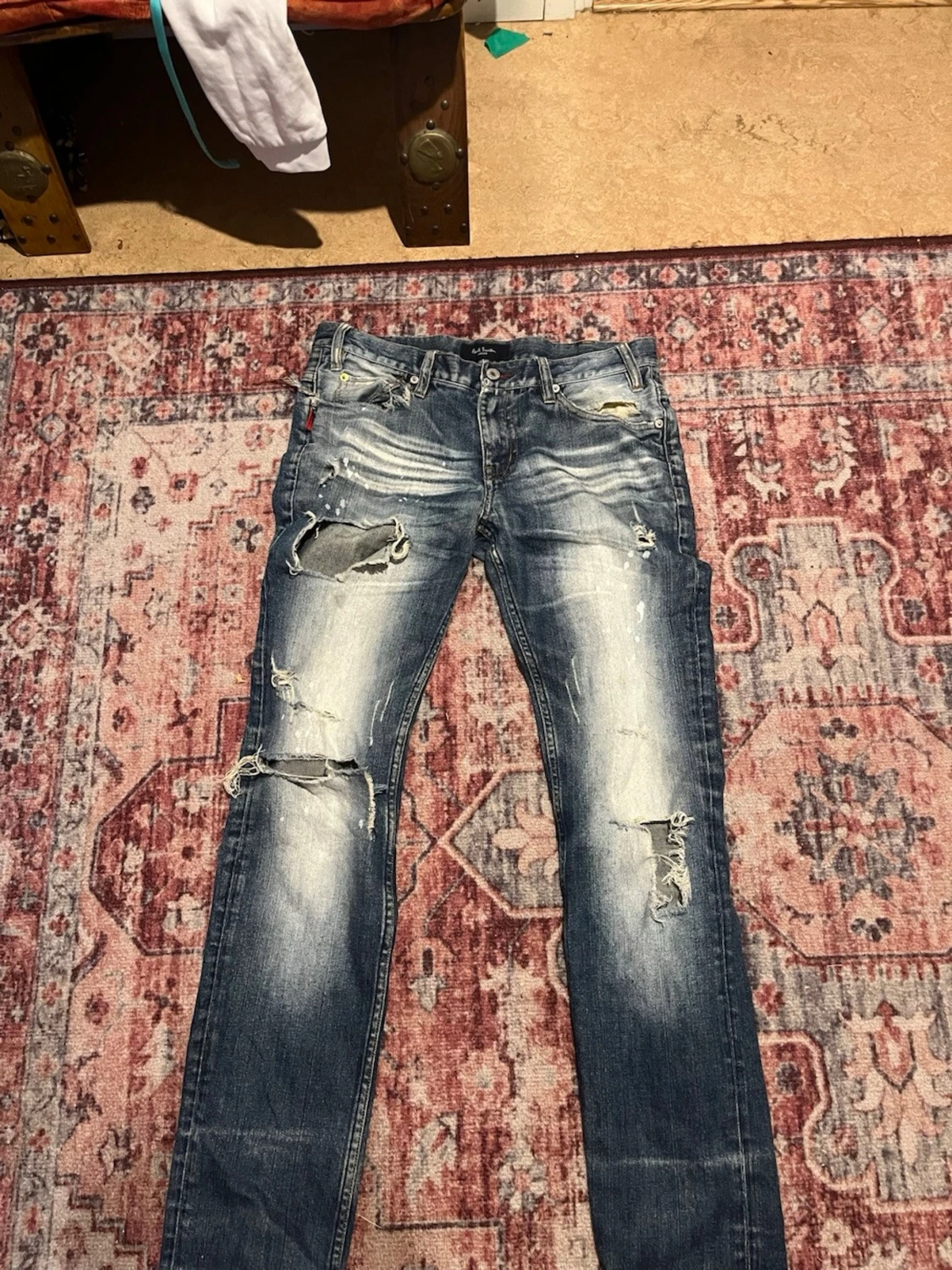 Blå slitna jeans från Paul Smith