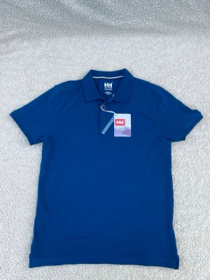 Helt ny Helly Hansen pike  - Helt ny aldrig använd med tags kvar. Ställ frågor om du har! Size S men passar också M 