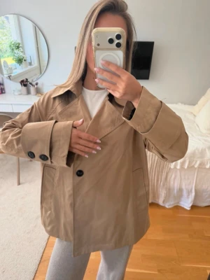 Trenchcoat - Fin trenchcoat