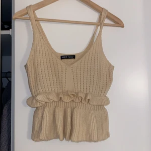 Stickat linne - Strl S. Beige.