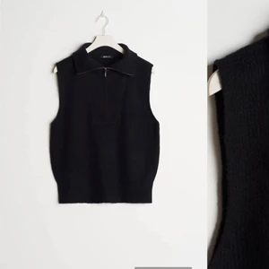 Stickad väst från Gina tricot - Stickad svart väst från Gina. Jättesnygg att ha över skjorta eller t shirt :) Passar M-XL