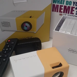 Mini projector and game cards - Bowth are good condition,only tried. 