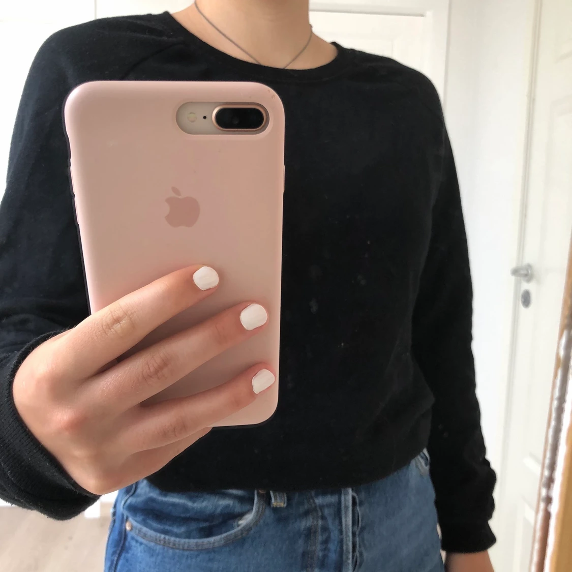 En svart långärmad tröja med knutna detaljer, S/36