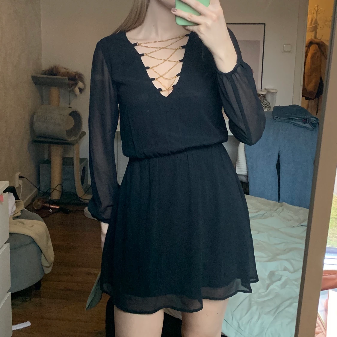 Klänning med kedjor