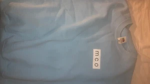 MCO sweatshirt - JÄTTEFIN babyblå sweatshirt i storlek M. Sitter snyggt oversized. Har en liknande i svart i storlek L. Frakt ingår ej ☺️ skriv privat för fler bilder