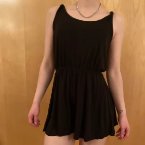 Basic shorts jumpsuit jumper - Black soft material shorts jumpsuit from H&M Basic. Perfect to just pull on during warm summer days, at home or to style with anything for a day out in town. Enhances curves. Good condition, used only a few times.