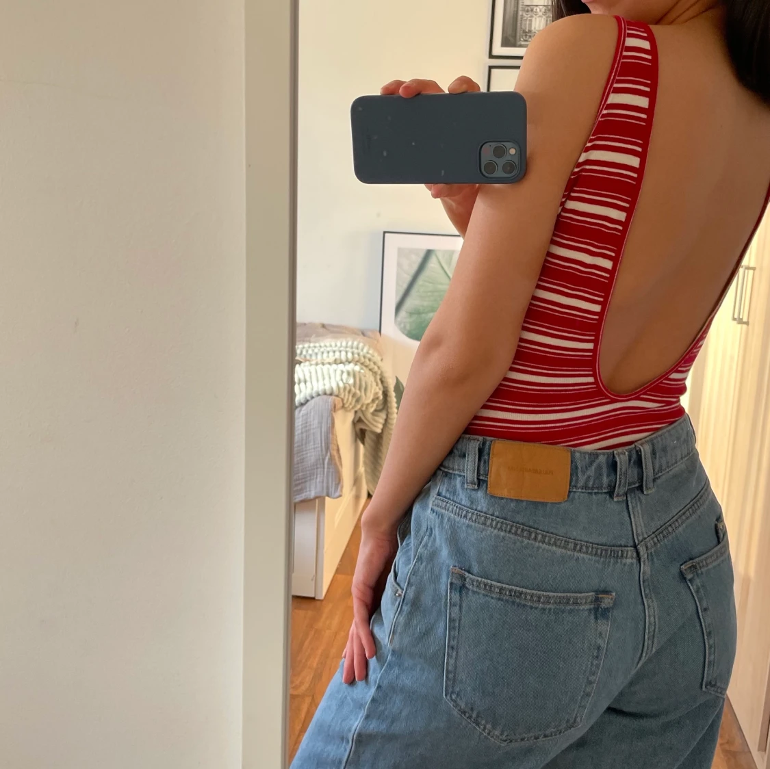 Randig bodysuit med öppen rygg - 90