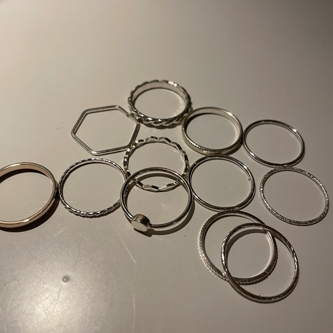 12 pack med ”silver” ringar