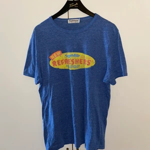 T-shirt  - T-shirt storlek M. Refresh logga på bröstet