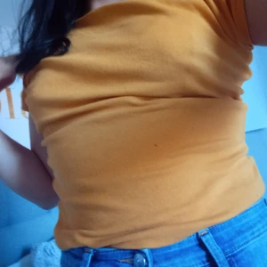 En orange topp från gina  - Skön och fin 40kr+frakt