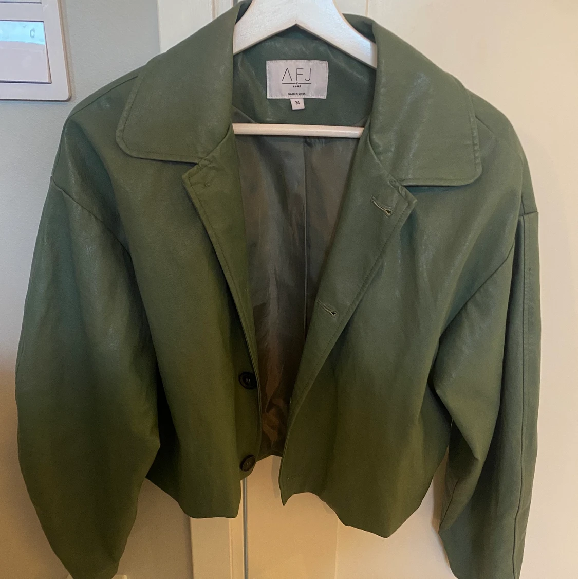 Grön skinnjacka  - 91