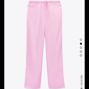 Rosa byxor - Rosa ”satin” byxor, aldrig använda! 