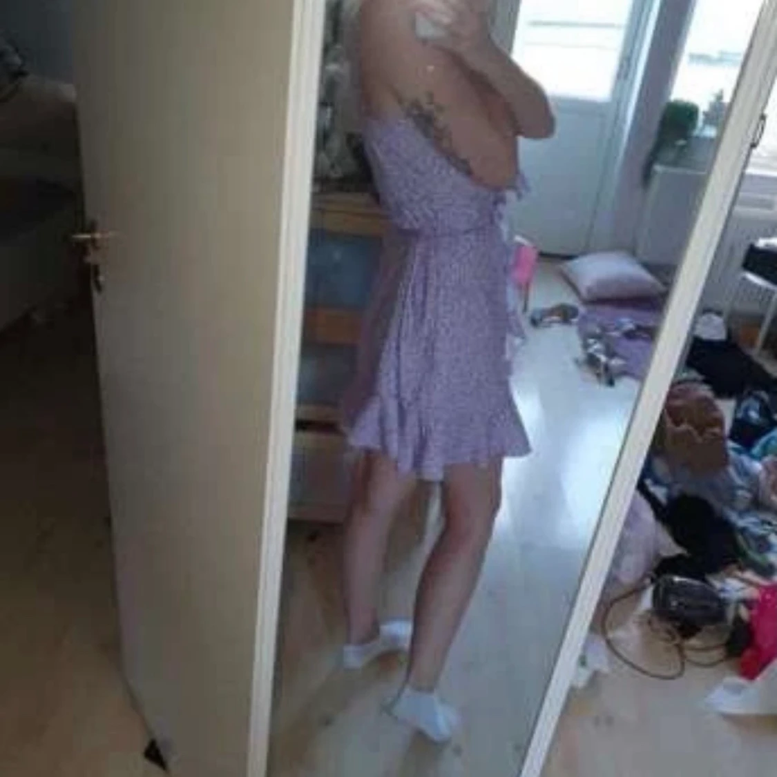 Lila omlottklänning