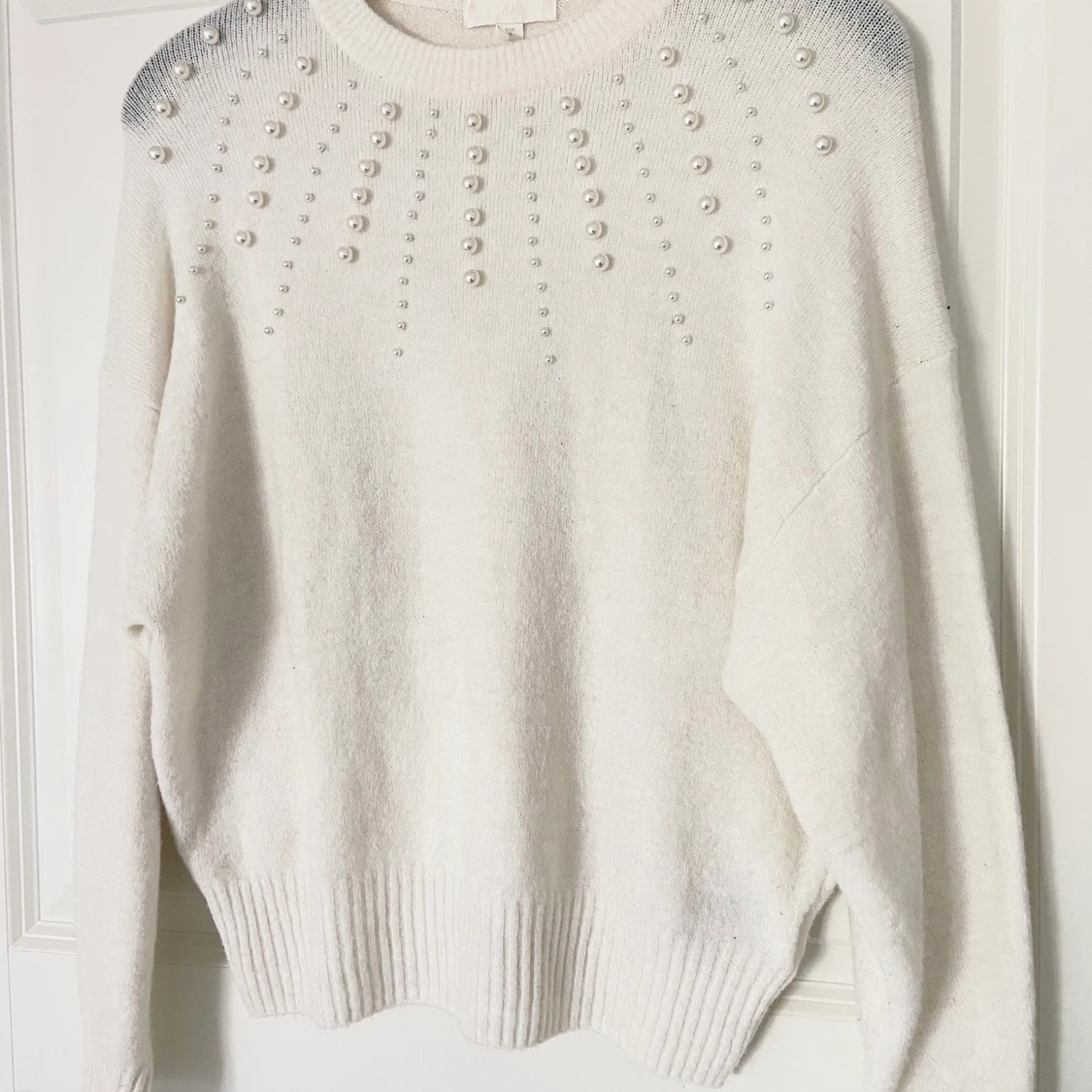 Vit stickad tröja