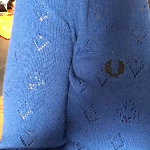 Fred Perry long knit. Amy Winehouse. - Amy Winehouse collection made for Fred Perry. Bought in the London flagship store. Worn once. Knit long cardigan with pockets. Size 38.