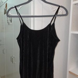 H&M Black Tank Top Size S - This tank top is very comfy, good material and is kind of long. It could fit M as well as S. Bought it this year and it’s in new condition.