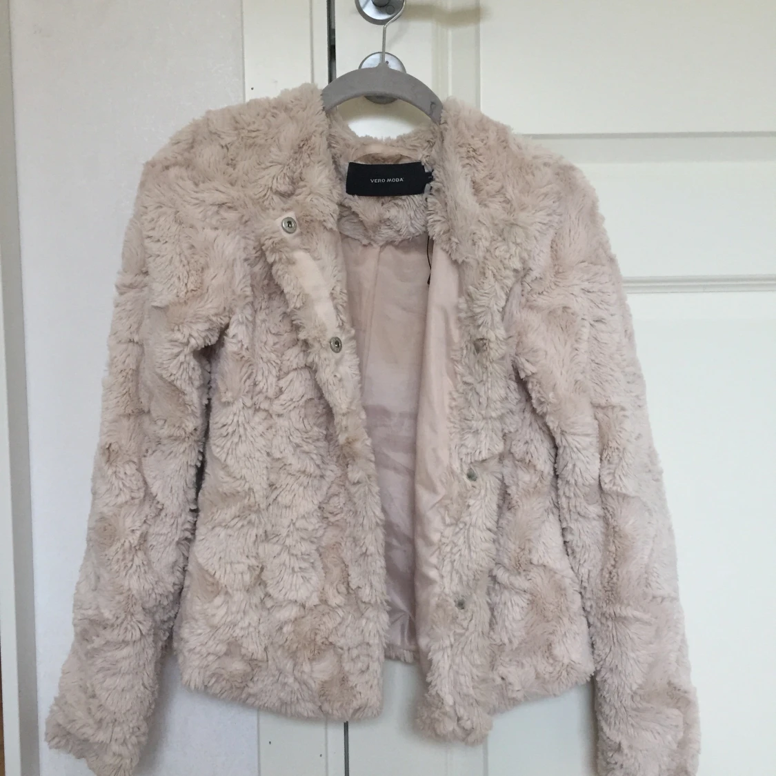 Beige/rosa pälsjacka